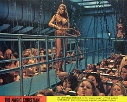 IN!  OUT!  Raquel Welch, in the 'engine room' of The MAGIC CHRISTIAN' with motive power supplied by topless maidens!