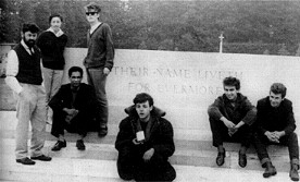 Hamburg became a regular destination for John and the others.  John took this picture in 1960 when they all stopped off in Arnheim Cemetery en route to Hamburg.  From left you can see Allan Williams, their manager at the time, Beyrl Williams, 'Lord Woodbine', the owner of a Liverpool strip club, Stuart, Paul, George and Pete Best