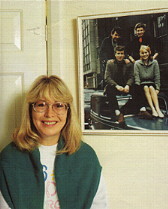 Memories... In her Isle of Man home, Cynthia stands by a photograph taken in her art student days in Liverpool.  She and John and two friends pose on the roof of a car