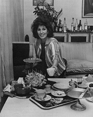 Alma clearing up after a party at her home with The Beatles